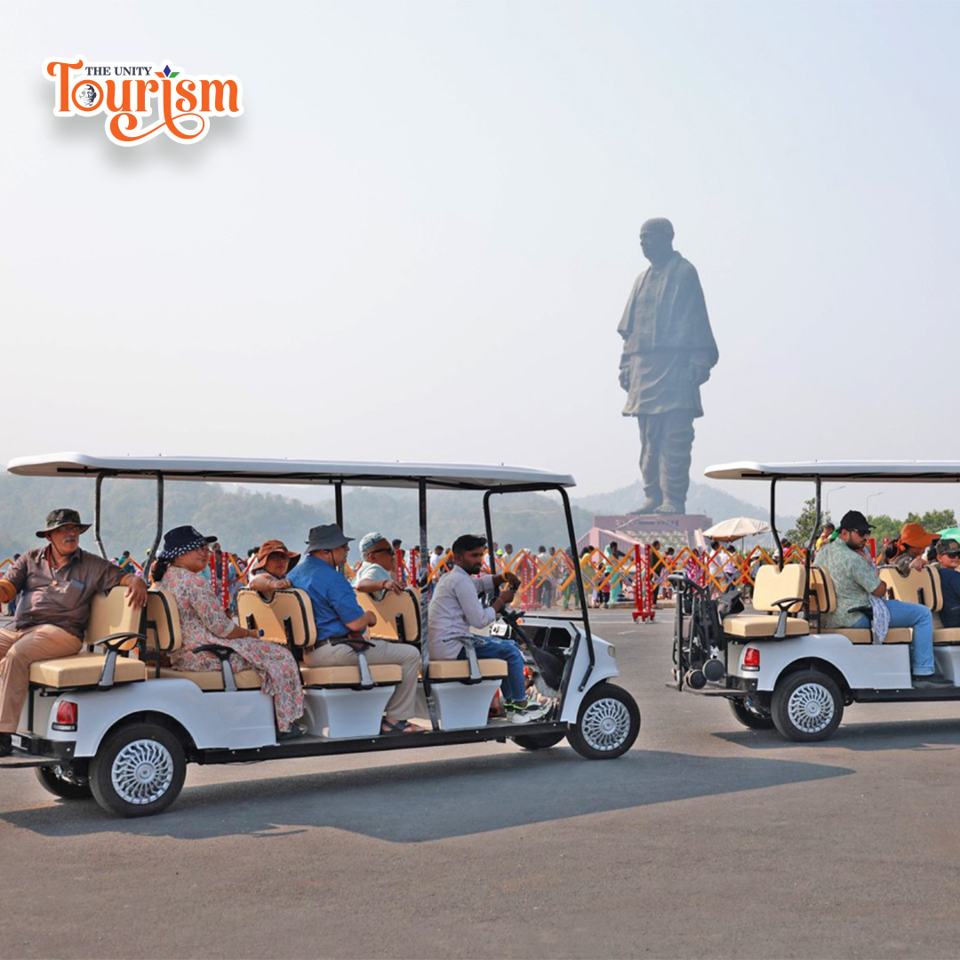 Tourists enjoying electric vehicle ride near Statue of Unity in Gujarat
