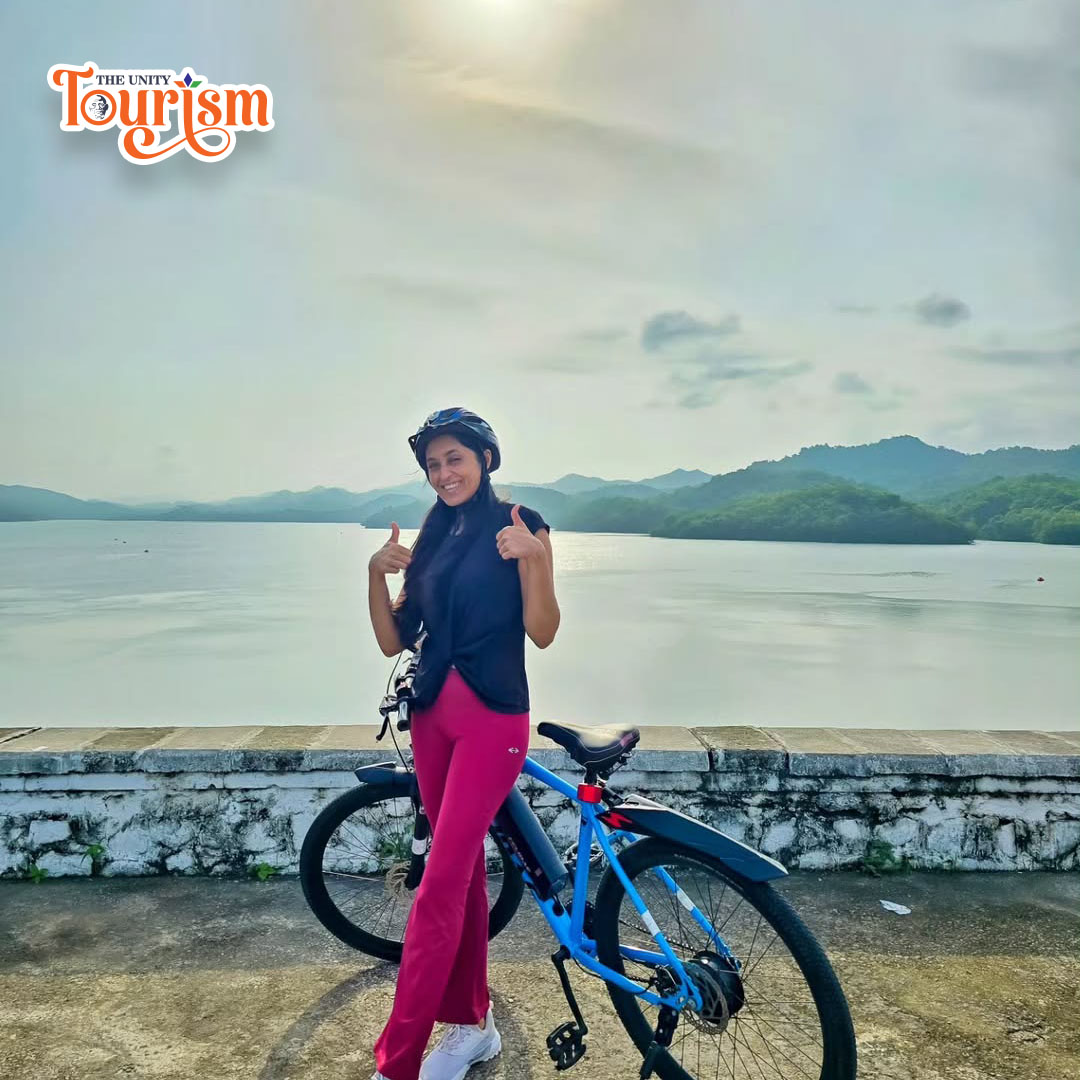 Visitors enjoying recreational cycling along the Statue of Unity riverside